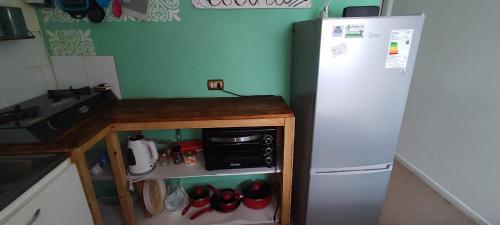Kuchyň nebo kuchyňský kout v ubytování Cabaña YaPide, 2 Dormitorios, Centrica