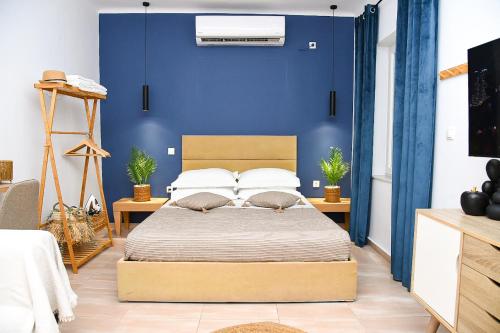Postel nebo postele na pokoji v ubytování OASIS RESIDENCE