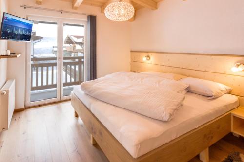 Postel nebo postele na pokoji v ubytování Haus Edmund