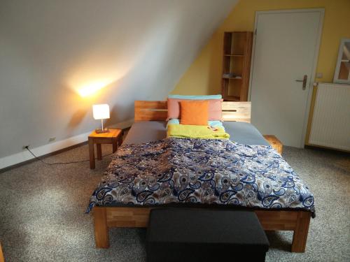 Postel nebo postele na pokoji v ubytování Ferienwohnung am Küstenwald