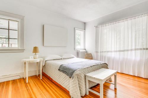 a white bedroom with a bed and a window at Hudson Valley Estate on 4 Acres with Private Pool! in Nyack