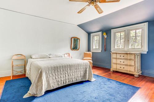 a bedroom with a bed and a ceiling fan at Hudson Valley Estate on 4 Acres with Private Pool! in Nyack