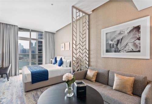 Posezení v ubytování Aliving Stylish Studio at DAMAC Prive with Balcony and Partial Burj Khalifa View-1315