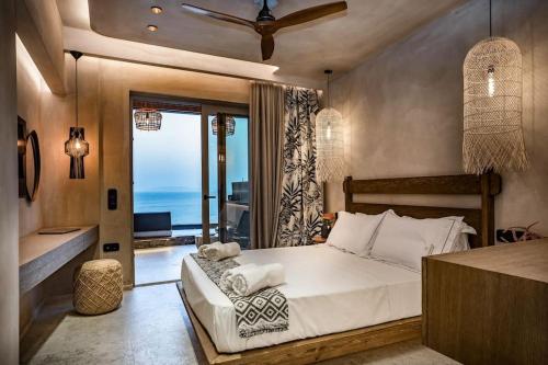 Ένα ή περισσότερα κρεβάτια σε δωμάτιο στο Paragon Suites 2