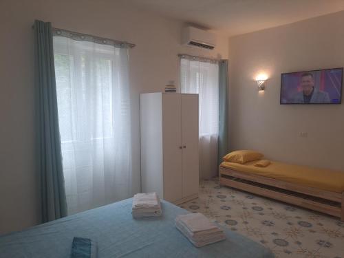 Postel nebo postele na pokoji v ubytování Citronia Relax