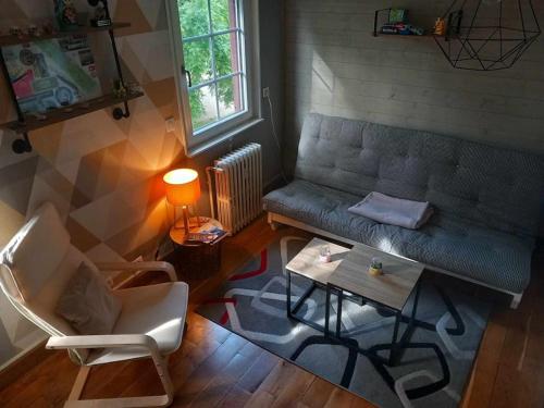 Χώρος καθιστικού στο Charmant Duplex au vert