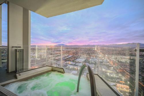 a hot tub with a view of a city at Romance Phenthouse at Palms Place in Las Vegas