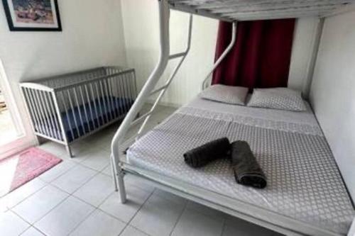 Postel nebo postele na pokoji v ubytování Maison authentique à 300m de la plage