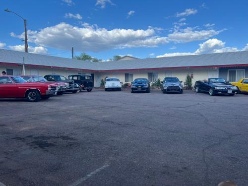 a group of cars parked in a parking lot at Supai Motel in Seligman