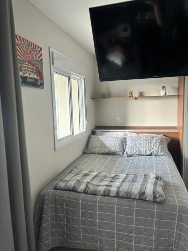 Postel nebo postele na pokoji v ubytování Studio completo e moderno