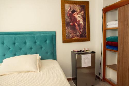 Postel nebo postele na pokoji v ubytování Habitación La Amelia