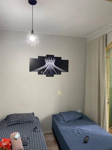 Giường trong phòng chung tại 3 hospedes valor unico