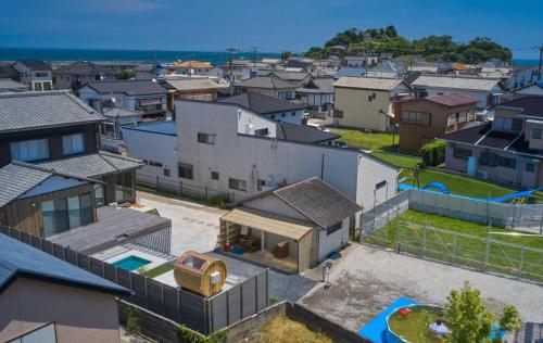 an aerial view of a city with houses at Sea Saw in Isumi