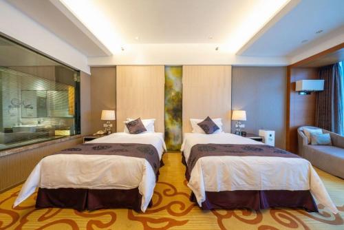 Katil atau katil-katil dalam bilik di 海门东恒盛国际大酒店