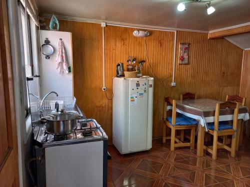 Køkken eller tekøkken på Cabaña Patagonia Rustica