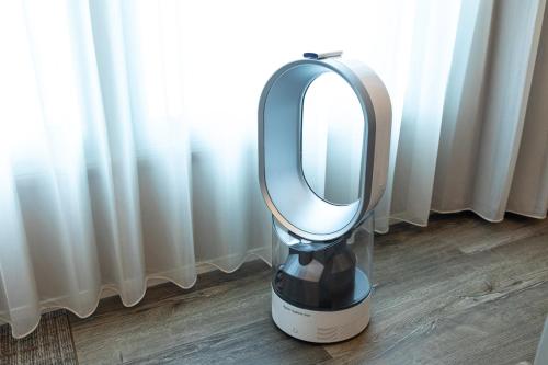 a blender sitting on the floor next to a window at HOTEL THE FLAG Shinsaibashi in Osaka