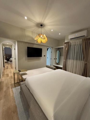 Postel nebo postele na pokoji v ubytování Punnpreeda Beach Resort - SHA Plus Certified