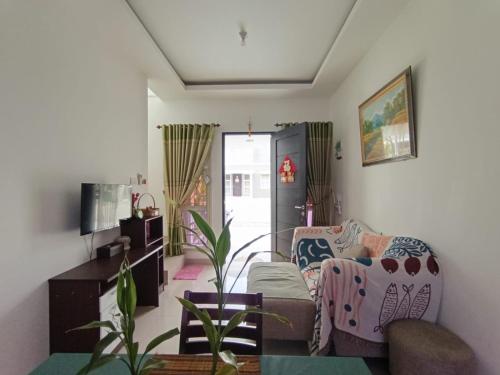 Телевизор и/или развлекательный центр в Sweet House Homestay Near Mall Pekanbaru Sudirman