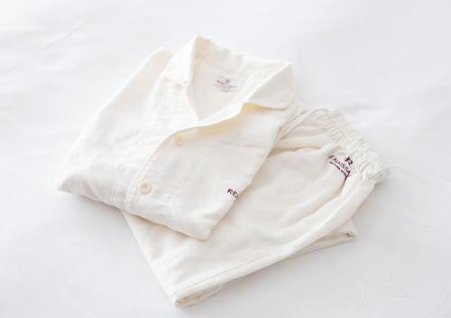 a white shirt laying on a white background at Renaissance Okinawa Resort in Onna