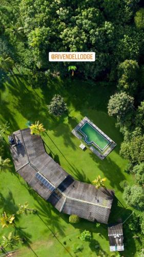 an overhead view of a house with a swimming pool at Rivendell Twisted Tree in Kurunegala