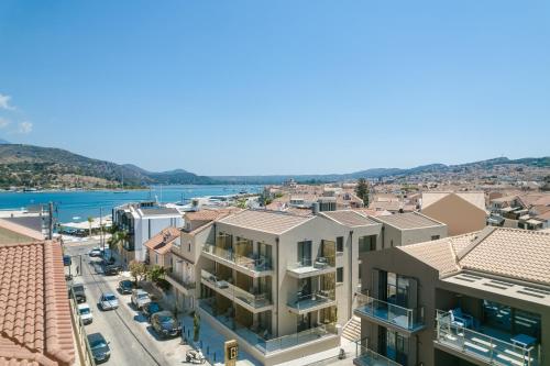 arial view of a city with buildings and a river at G Boutique Hotel Kefalonia in Argostoli