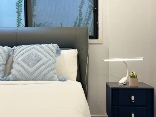 Ένα ή περισσότερα κρεβάτια σε δωμάτιο στο SHAREHOUSE 2bedroom-Retreat at Bardon