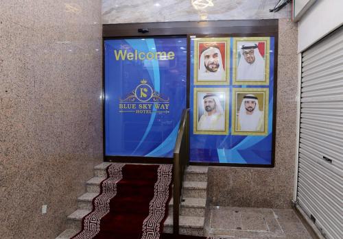 a welcome sign for a blue sky rayyan tour at Blue Sky Way Hotel in Dubai
