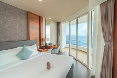Una cama o camas en una habitación de Seashells Phu Quoc Hotel & Spa