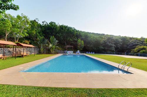 Bazén v ubytování The Estate Resort , Mangalore nebo v jeho okolí