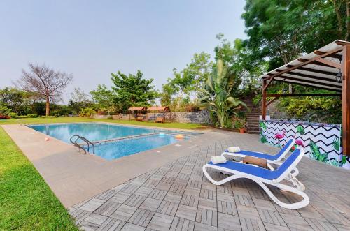 Bazén v ubytování The Estate Resort , Mangalore nebo v jeho okolí
