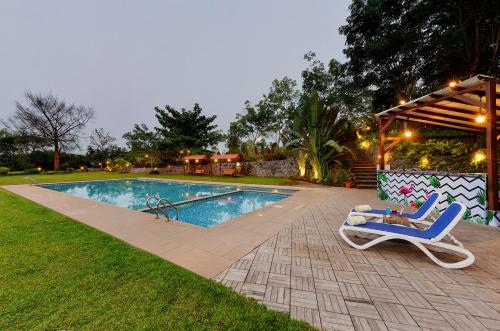 Bazén v ubytování The Estate Resort , Mangalore nebo v jeho okolí