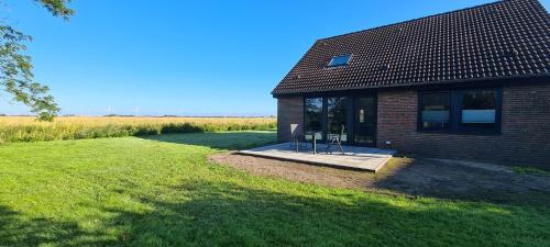 Taman di luar Ferienhaus Watt`n Blick - nah an der Nordsee