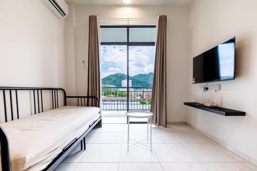 Ένα ή περισσότερα κρεβάτια σε δωμάτιο στο The Sun Executive #BayanLepas #QueensbayMall #8