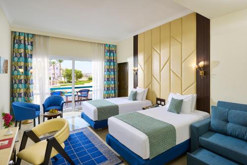 Postel nebo postele na pokoji v ubytování Dreams Beach Resort - Sharm El Sheikh