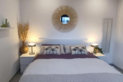 En eller flere senge i et værelse på Penthouse Atico Cálida