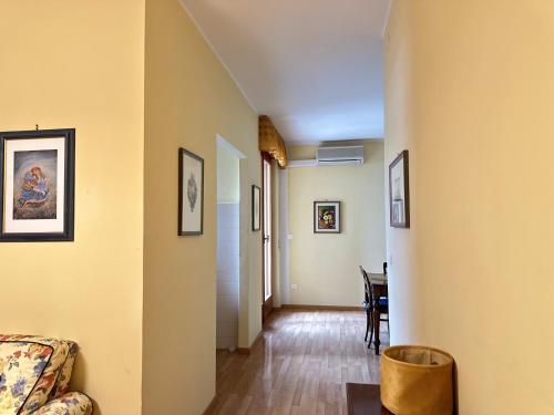 a living room with a couch and a table at Apartment Du Lac by GardaDoma in Brenzone sul Garda