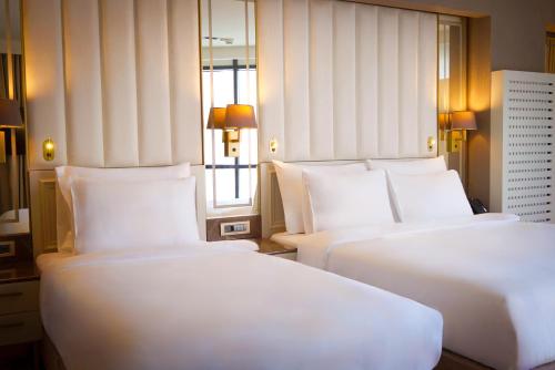 Letto o letti in una camera di The Hotels, Galata