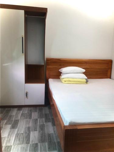Postel nebo postele na pokoji v ubytování Nhà nghỉ Dream