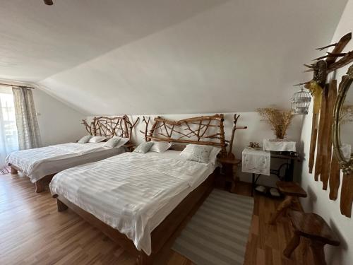 Postel nebo postele na pokoji v ubytování Casa Vlad