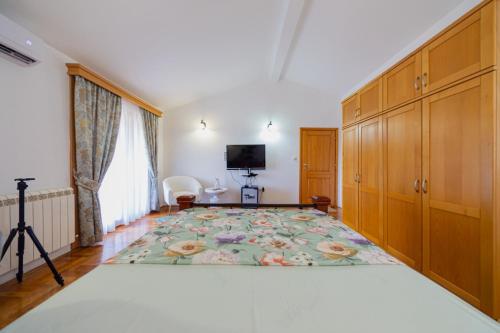 Ein Bett oder Betten in einem Zimmer der Unterkunft Villa Jakov