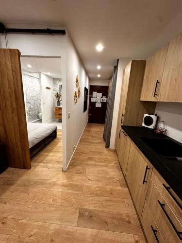 Kuchyň nebo kuchyňský kout v ubytování Appartement cosy proche mer calme