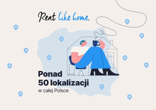 mężczyzna siedzący na krześle z filiżanką kawy i przetłumaczony tłumaczony tłumaczony w obiekcie Rent like home - Ciągłówka w Zakopanem