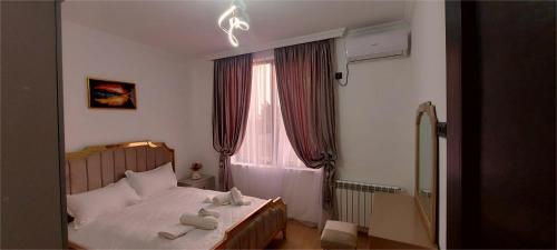 Ένα ή περισσότερα κρεβάτια σε δωμάτιο στο Villa Gio Kvareli