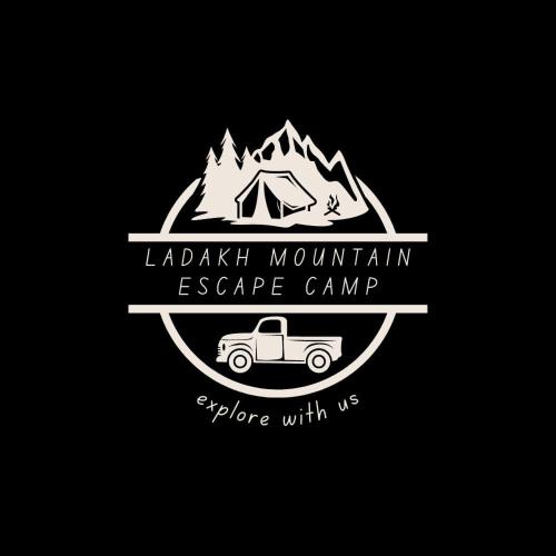 a campsite and a truck with a tent and a campsiteruck at Ladakh Mountian Escape Camp by LexStays in Leh