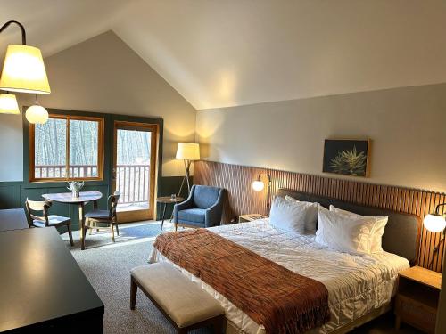 Voodi või voodid majutusasutuse Minnewaska Lodge toas