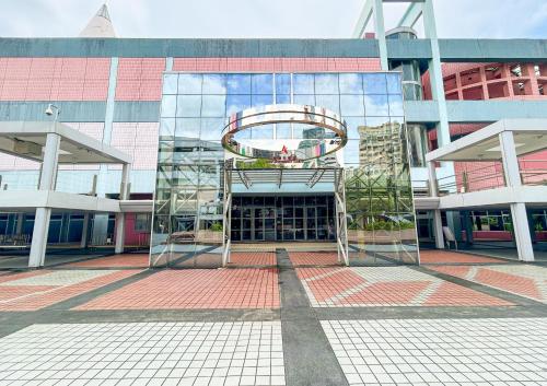 a building with a mural on the side of it at Urbanwood Hung Hom in Hong Kong