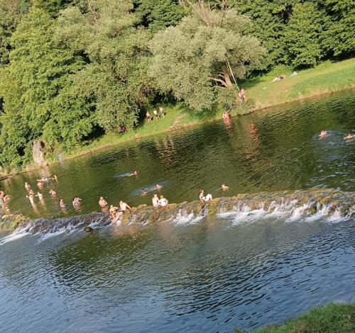a group of people swimming in a river at Galoma Korana in Gornji Velemerić
