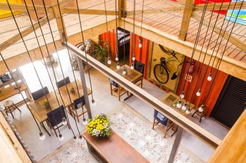 an overhead view of a room with a table and chairs at Alma Brava in Itajaí