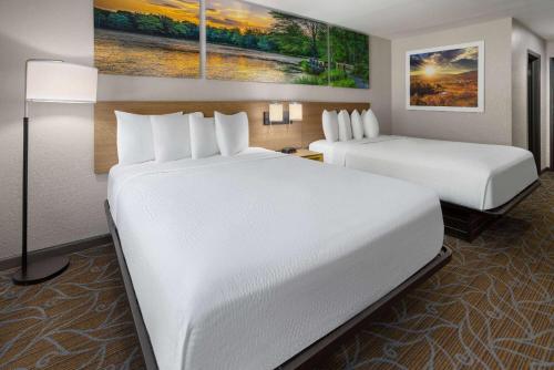 Ένα ή περισσότερα κρεβάτια σε δωμάτιο στο Days Inn by Wyndham Wurtsboro