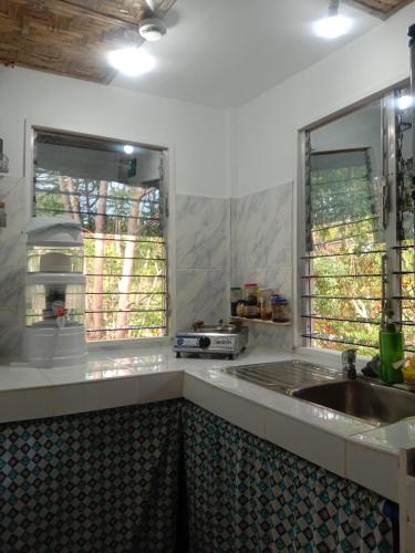 Η κουζίνα ή μικρή κουζίνα στο Seabreeze Guesthouse